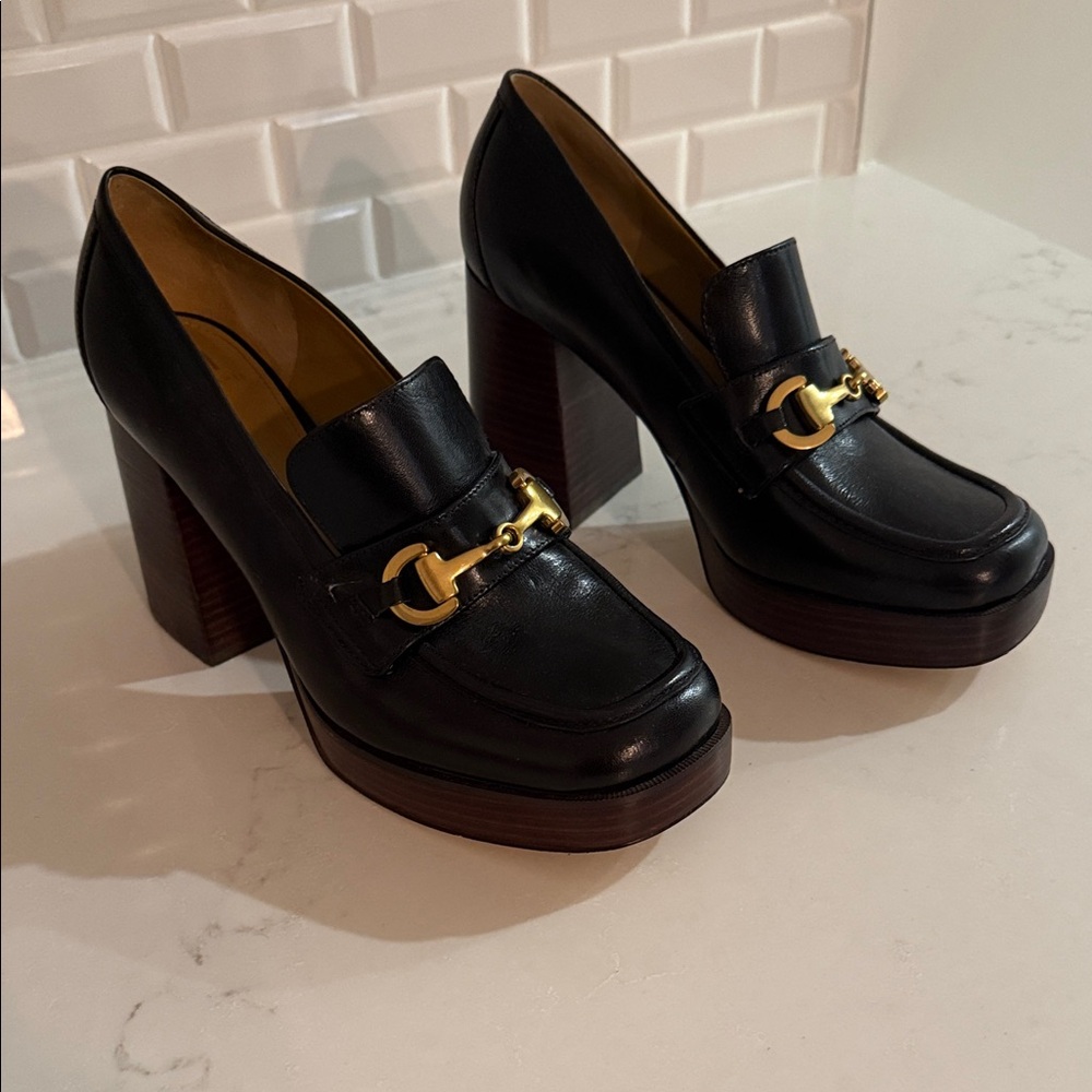 Marc Fisher  Elegant Black Loafers with Gold Accent